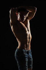 Image showing Muscle man posing in studio