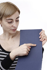 Image showing Woman holding a paper