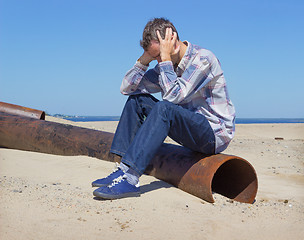 Image showing Lonely young man suffering from depression