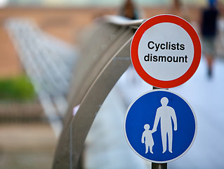 Image showing Cyclists, track sign