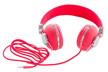 Image showing Vibrant red wired headphones isolated