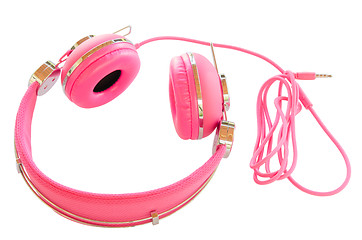 Image showing Vivid pink colorful wired headphones