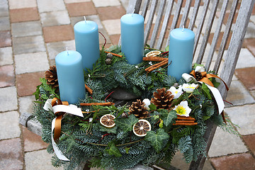 Image showing Christmas wreath with blue candles