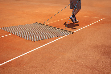 Image showing Aligning tennis court