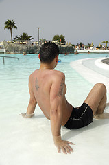 Image showing Man relaxing in pool