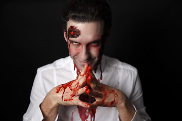 Image showing Psychopath with bloody hands