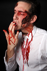 Image showing Psychopath with bloody fingers