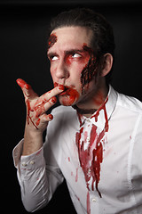 Image showing Psychopath with bloody knive