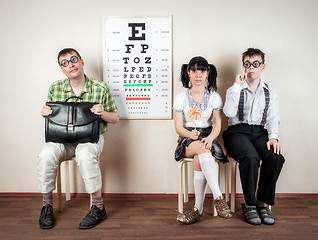 Image showing Three person wearing spectacles in an office at the doctor