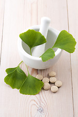 Image showing Ginkgo biloba leaves in mortar and pills