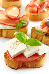 Image showing Toasted bread with fresh goat cheese and tomato