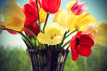 Image showing Bouquet of colorful spring tulips in a vase