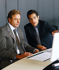 Image showing Two concentrated businessmen