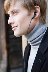 Image showing man listens to music