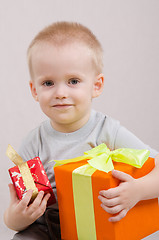 Image showing Happy child with gifts