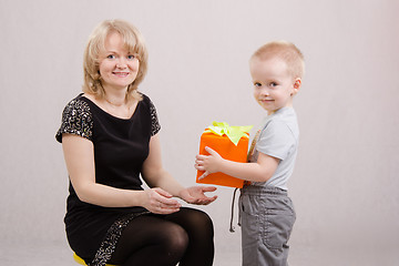 Image showing Boy congratulates mom happy birthday