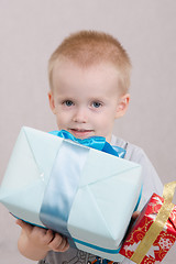 Image showing Boy with big gift