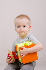 Image showing Year-old boy with gifts