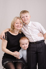 Image showing Mom, thirteen and five year old son