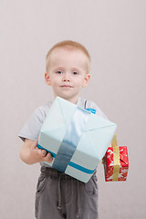 Image showing The boy gave gifts