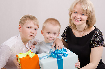 Image showing Child presented with gifts