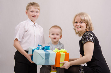 Image showing Child give gifts