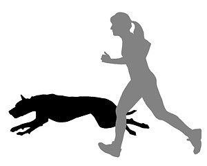 Image showing Woman jogs with dog