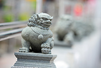 Image showing Chinese lion statue in garden 