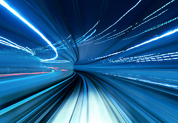 Image showing Train moving fast in tunnel 