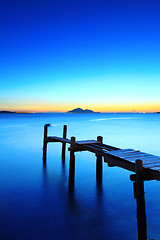 Image showing Seascape with broken bridge during sunset