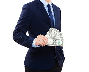 Image showing Businessman showing cash