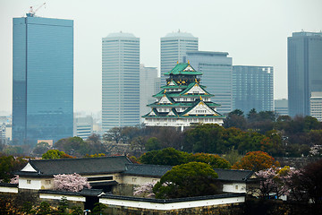 Image showing Osaka castle in commercial district in japan