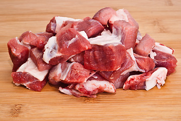 Image showing Raw beef on wooden board