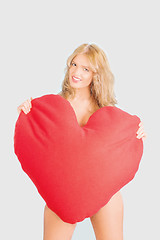 Image showing sexy woman holding a heart