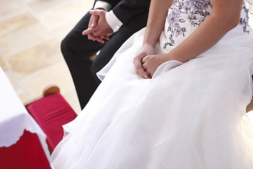 Image showing Hands of a bride and groom