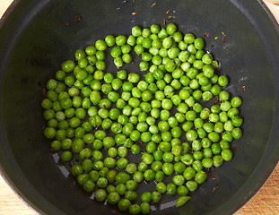 Image showing Green peas in a pan