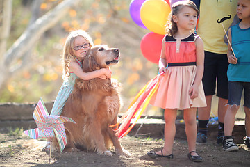 Image showing Children Enjoying a Fashionable Outdoor Birthday Party