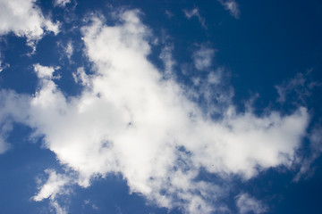 Image showing Deep blue sky with white clouds