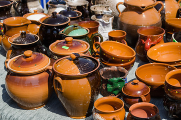 Image showing clay pots cups various sizes shapes on fair stall 