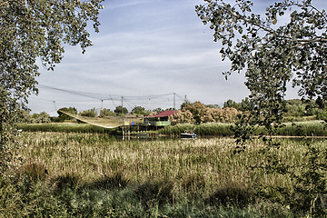 Image showing Fishing shack on sea channel