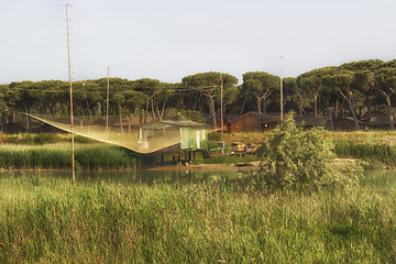 Image showing Fishing shack on sea channel