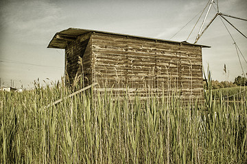 Image showing Fishing shack on sea channel