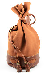 Image showing brown suede pouch on white background