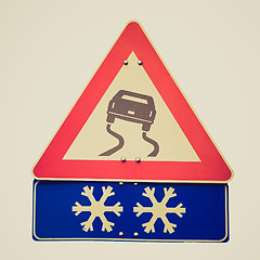 Image showing Retro look Slippery road sign