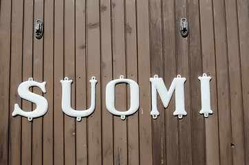 Image showing vintage inscription on the railway carriage Suomi