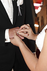 Image showing Hands of a bride and groom