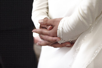 Image showing Hands of a bride and groom