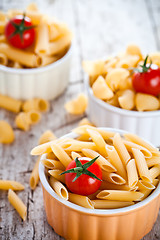 Image showing uncooked pasta and cherry tomatoes