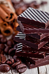 Image showing chocolate sweets, cinnamon and coffee beans 