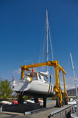 Image showing Sailboat being docked